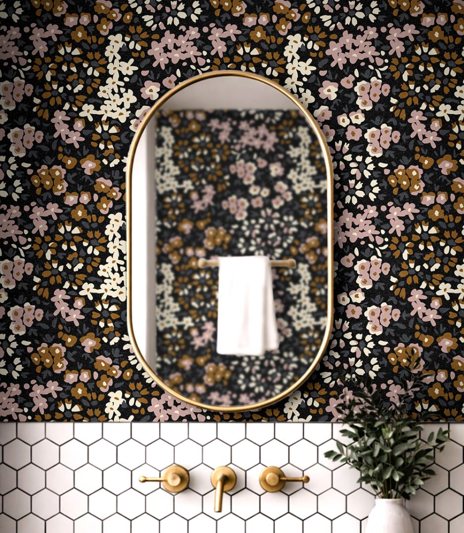 Dark floral calico wallpaper featuring mauve and warm neutral blooms shown in a bedroom or powder room setting.