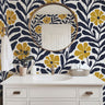 midnight marigold navy floral wallpaper in bathroom with navy vanity