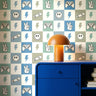 boys room checker wallpaper with gaming icons in modern kids bedroom