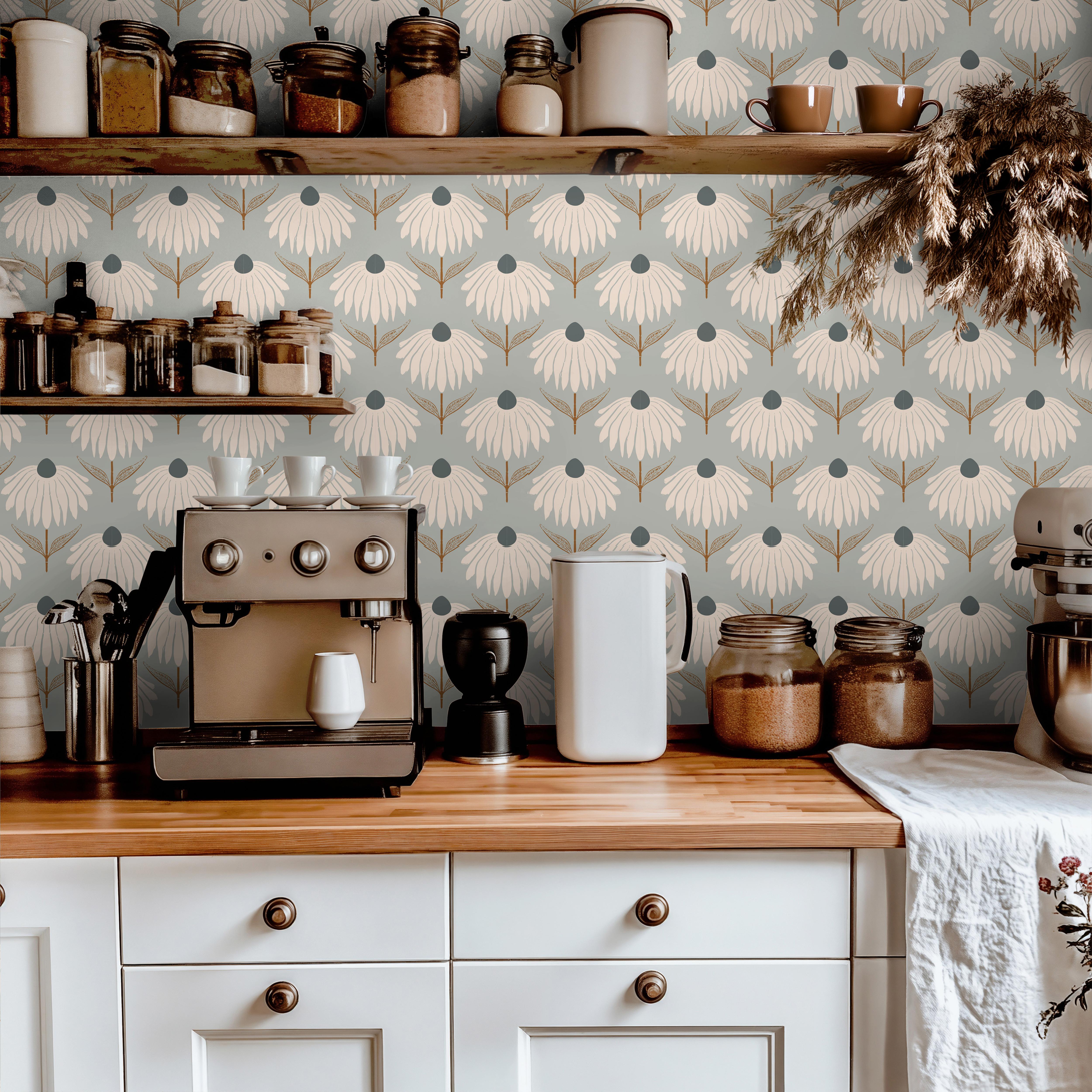 muted blue green coneflower wallpaper behind coffee bar with wood shelves jars and white cabinets