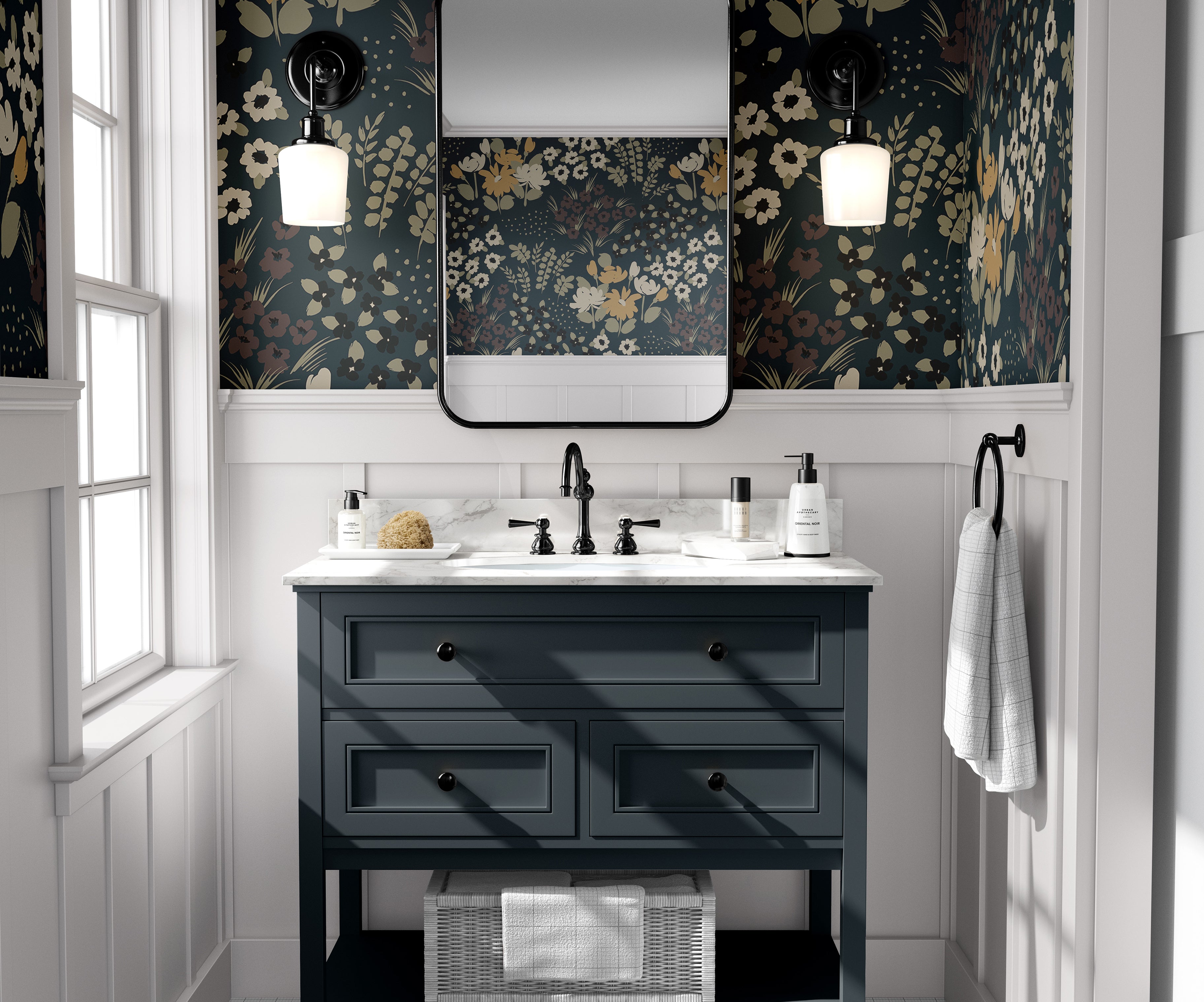 Moody floral wallpaper styled in a dramatic bathroom with navy vanity, black fixtures, and vintage botanical blooms.