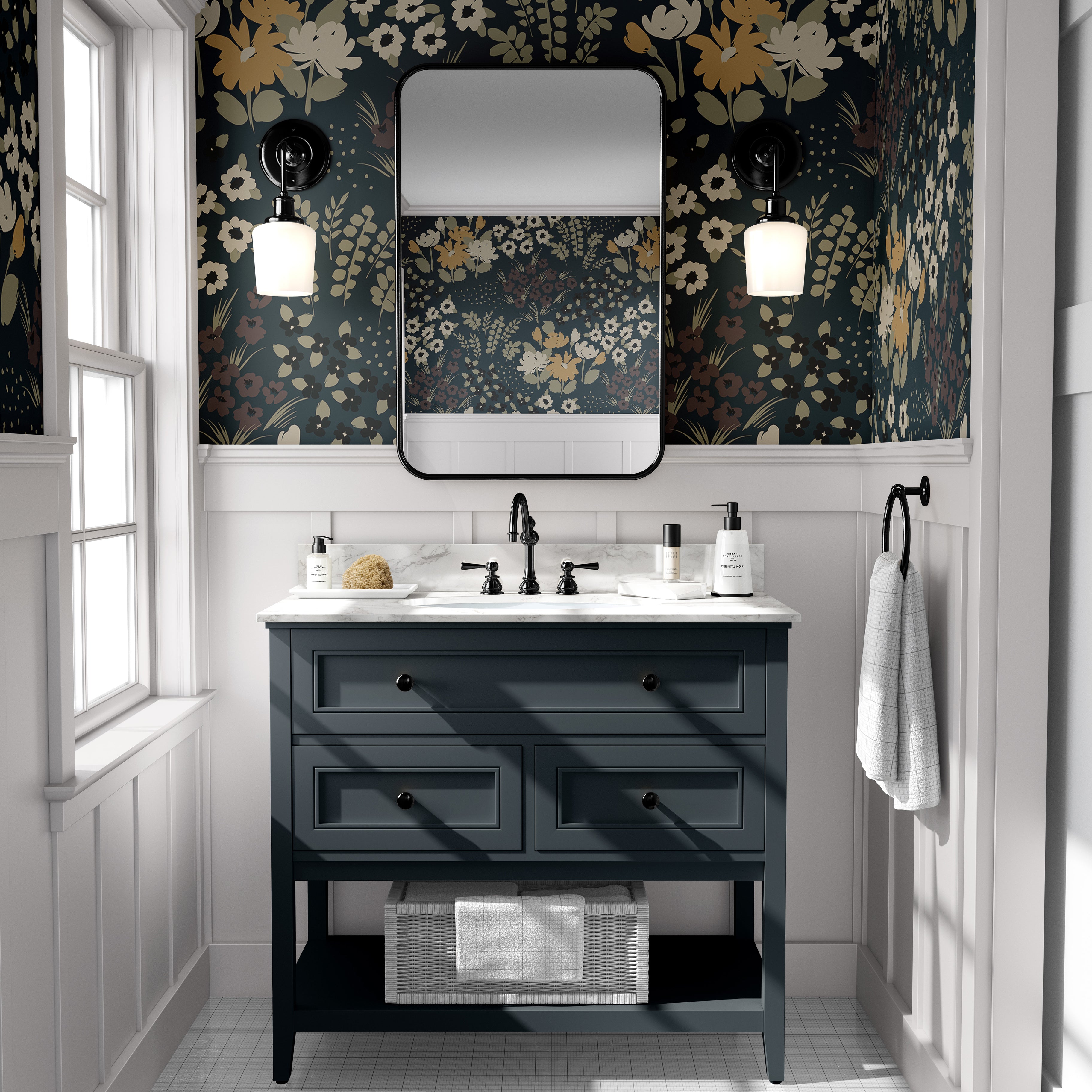 Moody floral wallpaper styled in a dramatic bathroom with navy vanity, black fixtures, and vintage botanical blooms.