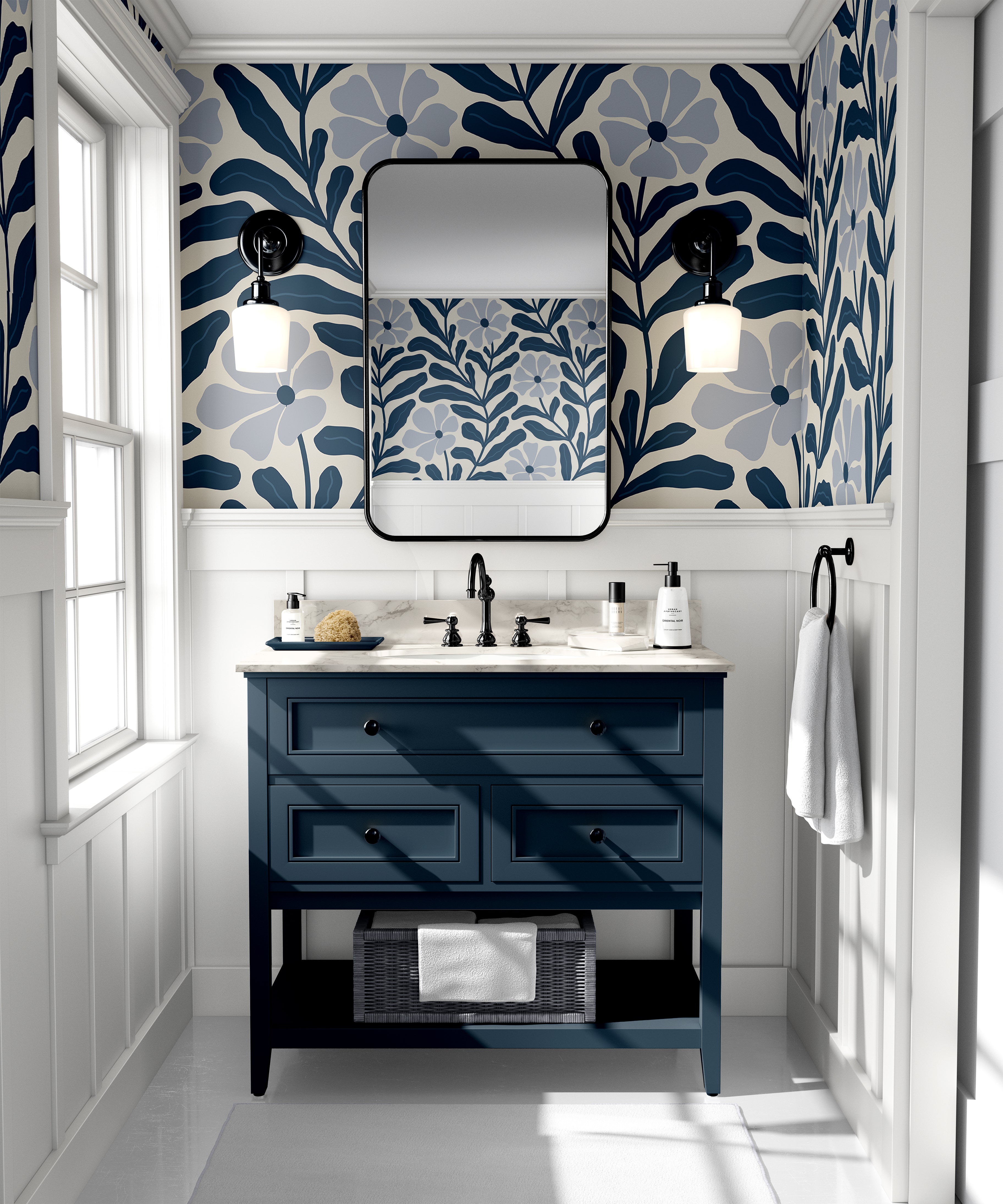Navy Nature floral wallpaper with oversized navy botanical leaves and soft blue flowers styled above a navy bathroom vanity.
