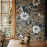  Moody floral wallpaper with bronze flowers and ivory blooms styled in a warm wood dining room with cozy vintage decor.
