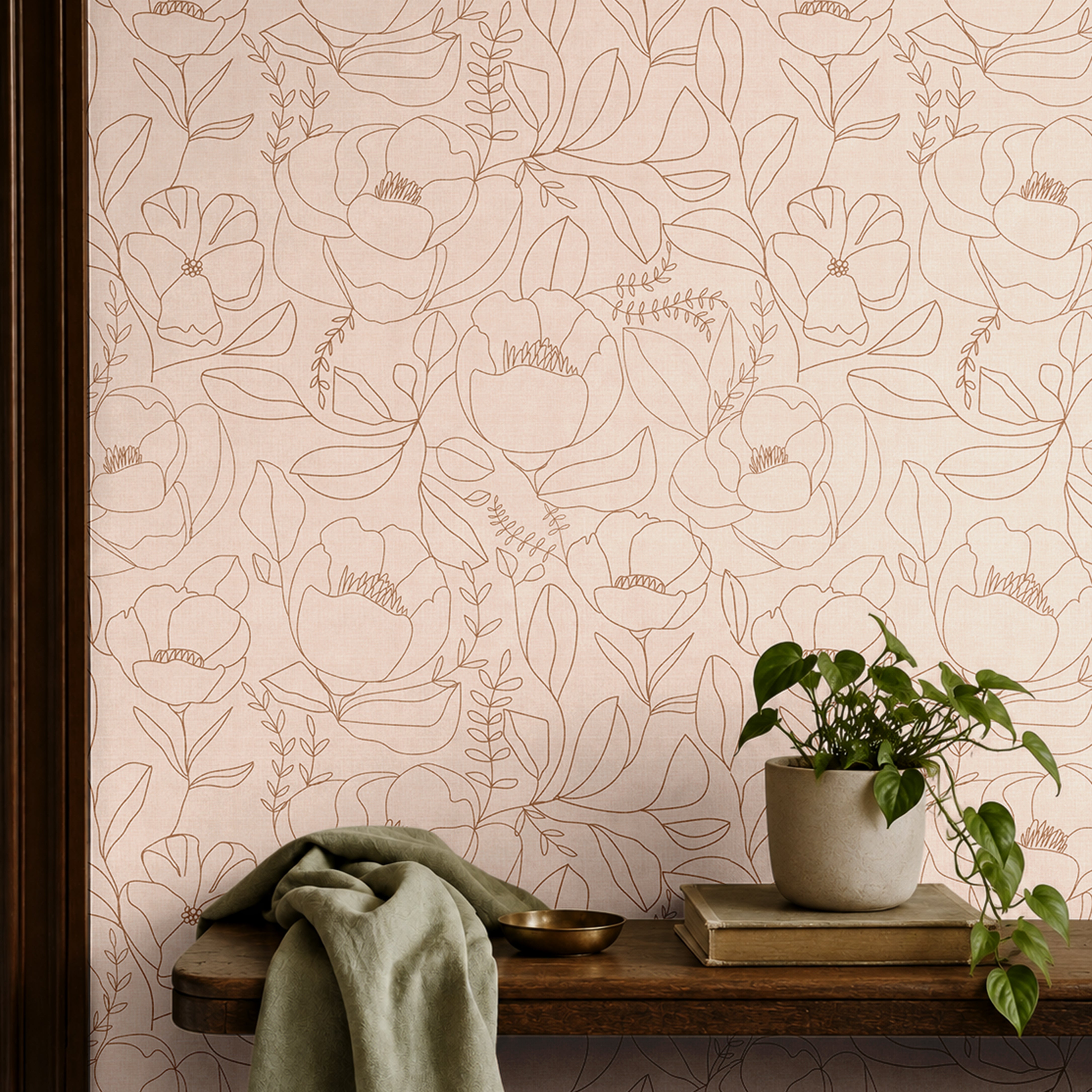 Open Bloom neutral blush floral wallpaper with oversized botanical line drawings styled above a vintage wood console