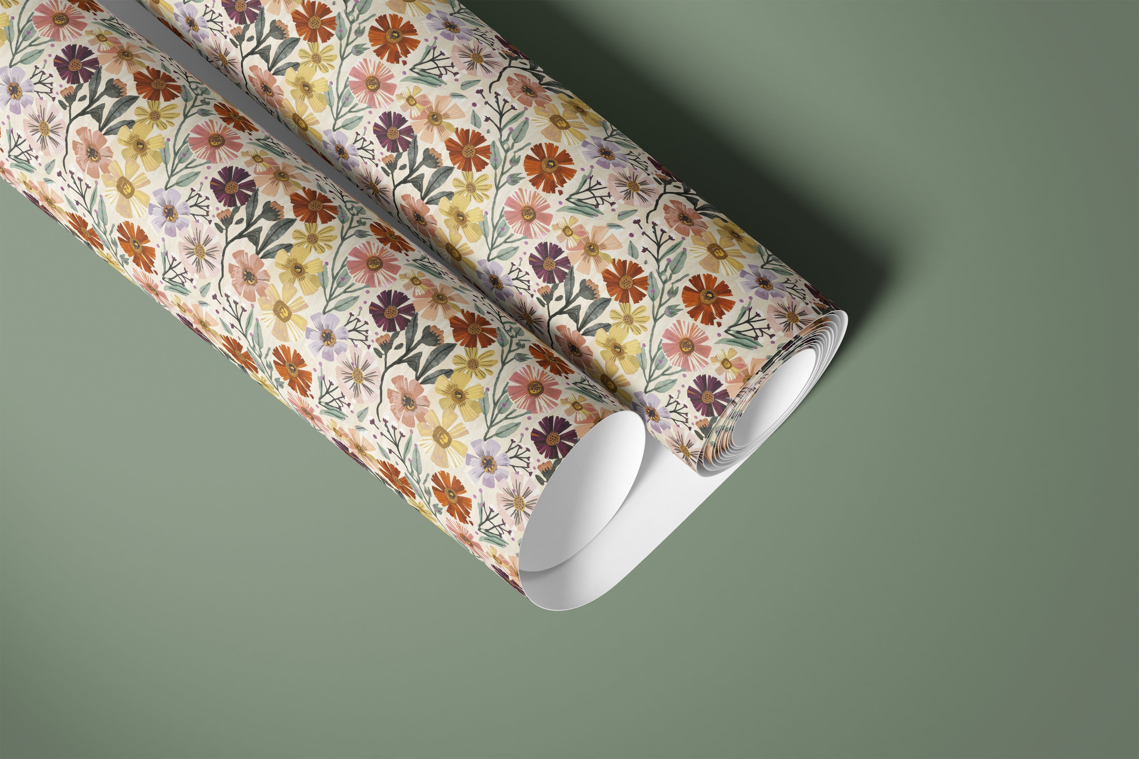  roll of painted bloomscape contact paper with multicolor flowers sage leaves and cream background on deep sage green background