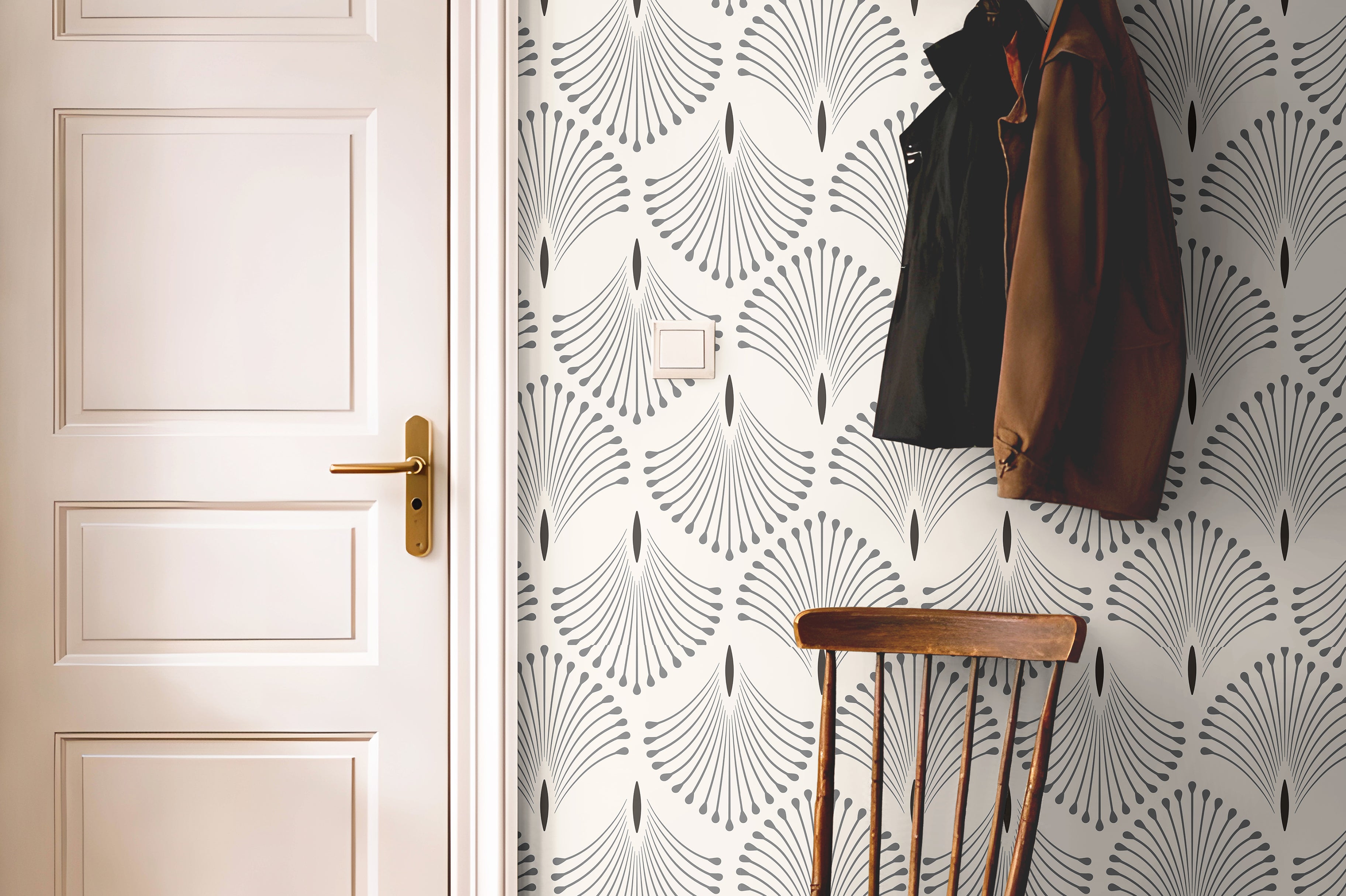 Taupe geometric wallpaper with minimalist Art Deco styling and repeating botanical fan motifs.