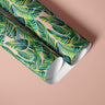Green palm leaf contact paper on blush background