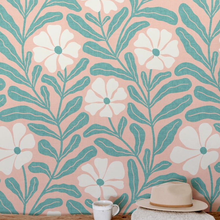soft botanical wallpaper showing layered blush petals and green foliage