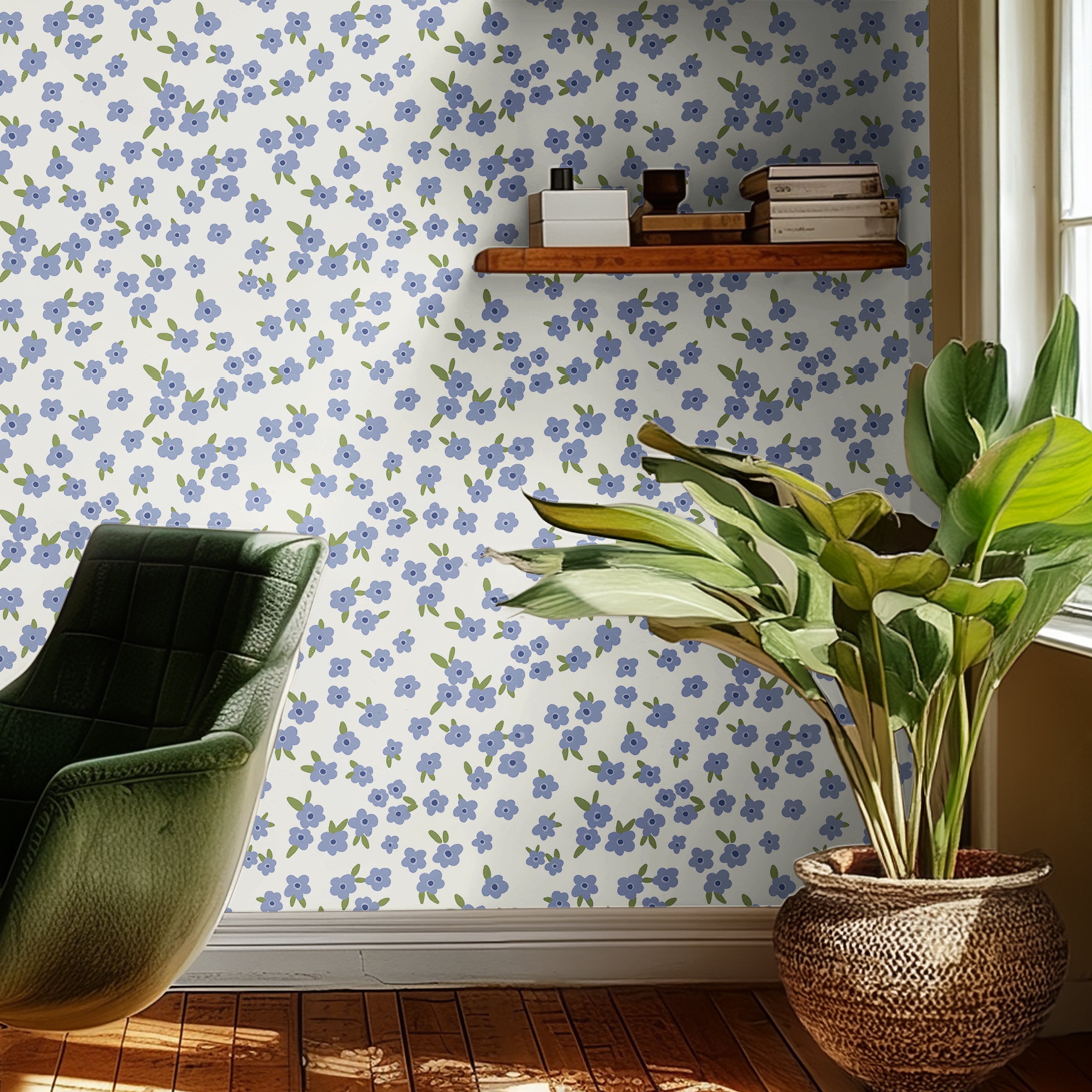 Blue floral wallpaper with scattered white and soft blue flowers on a light background in a cozy office setting