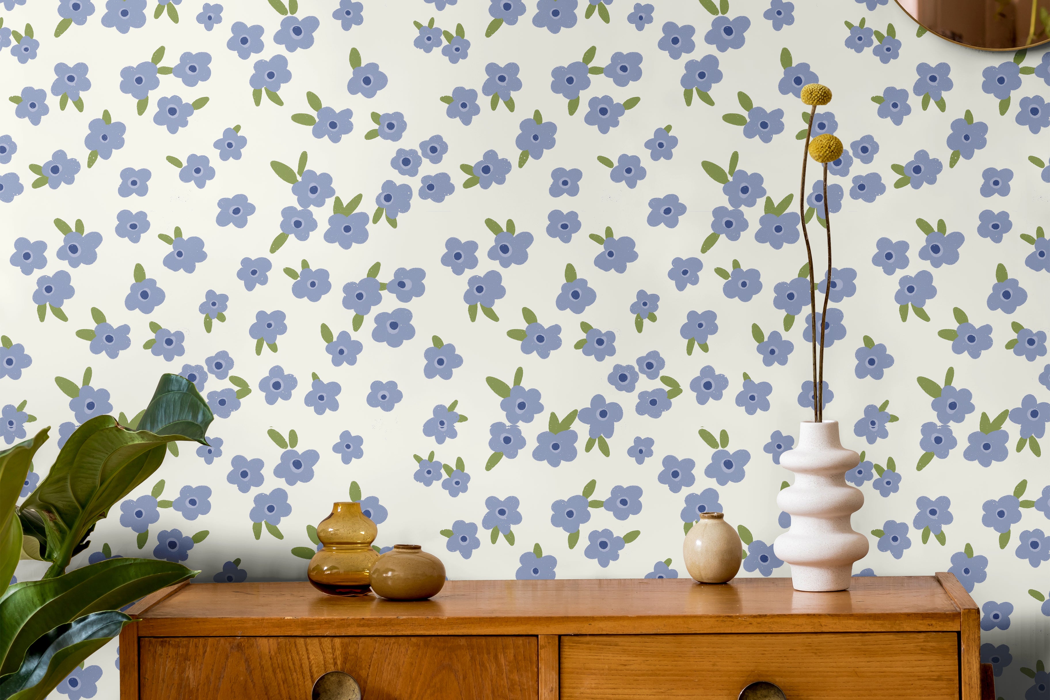 Light Blue floral wallpaper with scattered white and soft blue flowers on a light background in a cozy bedroom setting