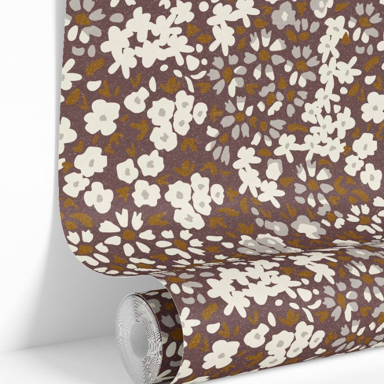 Roll image: rolled floral wallpaper showing earthy mauve calico botanical design