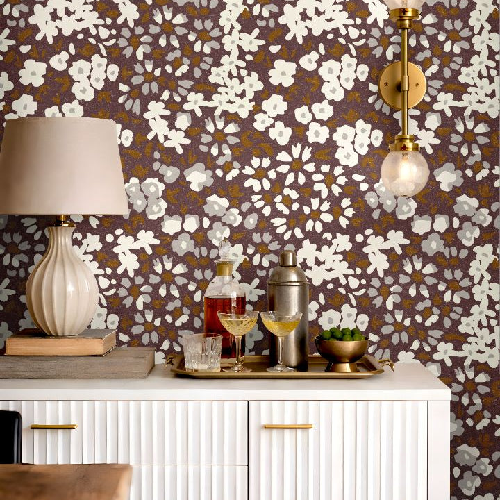 Detail image: close up of earthy mauve floral wallpaper with calico inspired botanical pattern