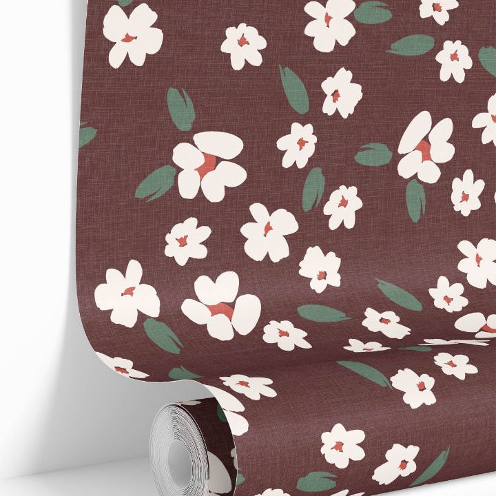 Wallpaper roll of Petals in Merlot floral design with scattered ivory flowers