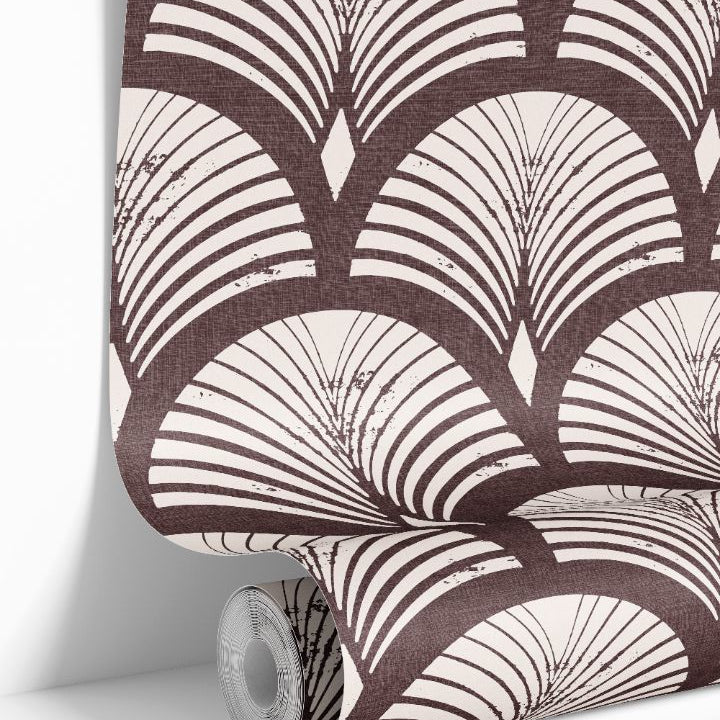 roll of reservecroft burgundy wallpaper with warm ivory fan arches and woven look texture