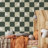  kids dinosaur wallpaper with checker pattern in bedroom setting