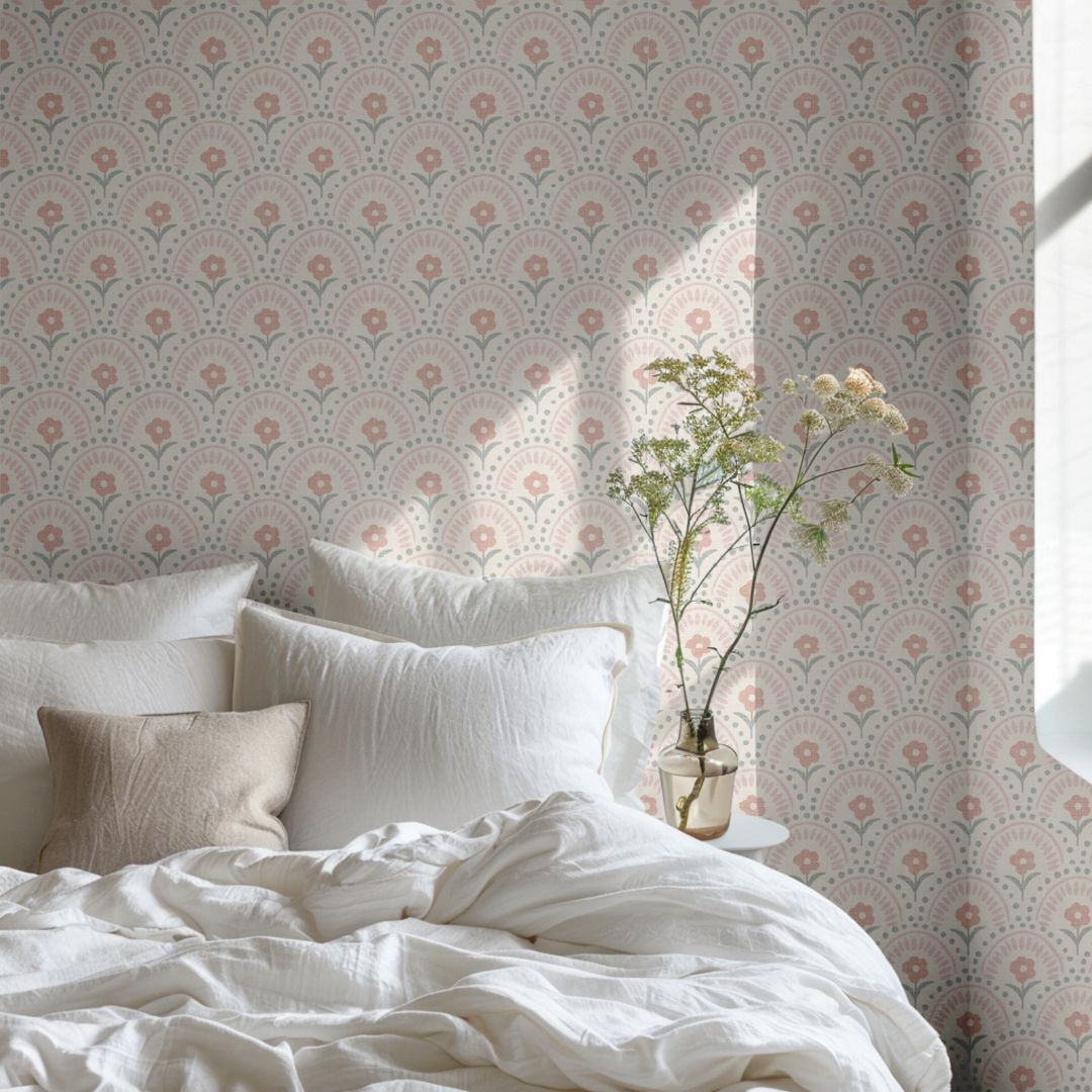 Rosette Arch Wallpaper behind white bedding with soft natural light and blush tones
