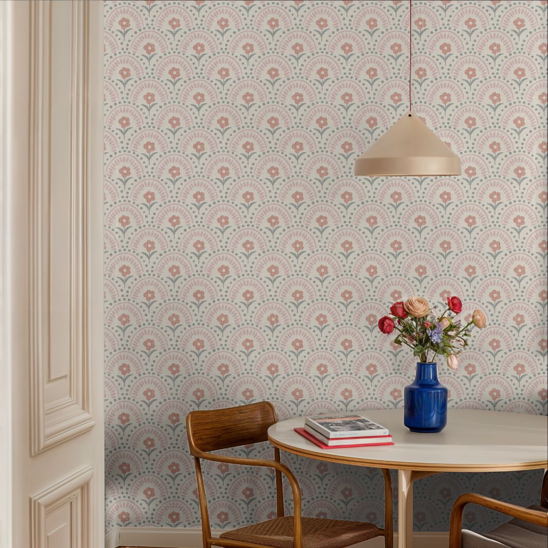 Rosette Arch Wallpaper in dining nook with flowers, books, and pendant light