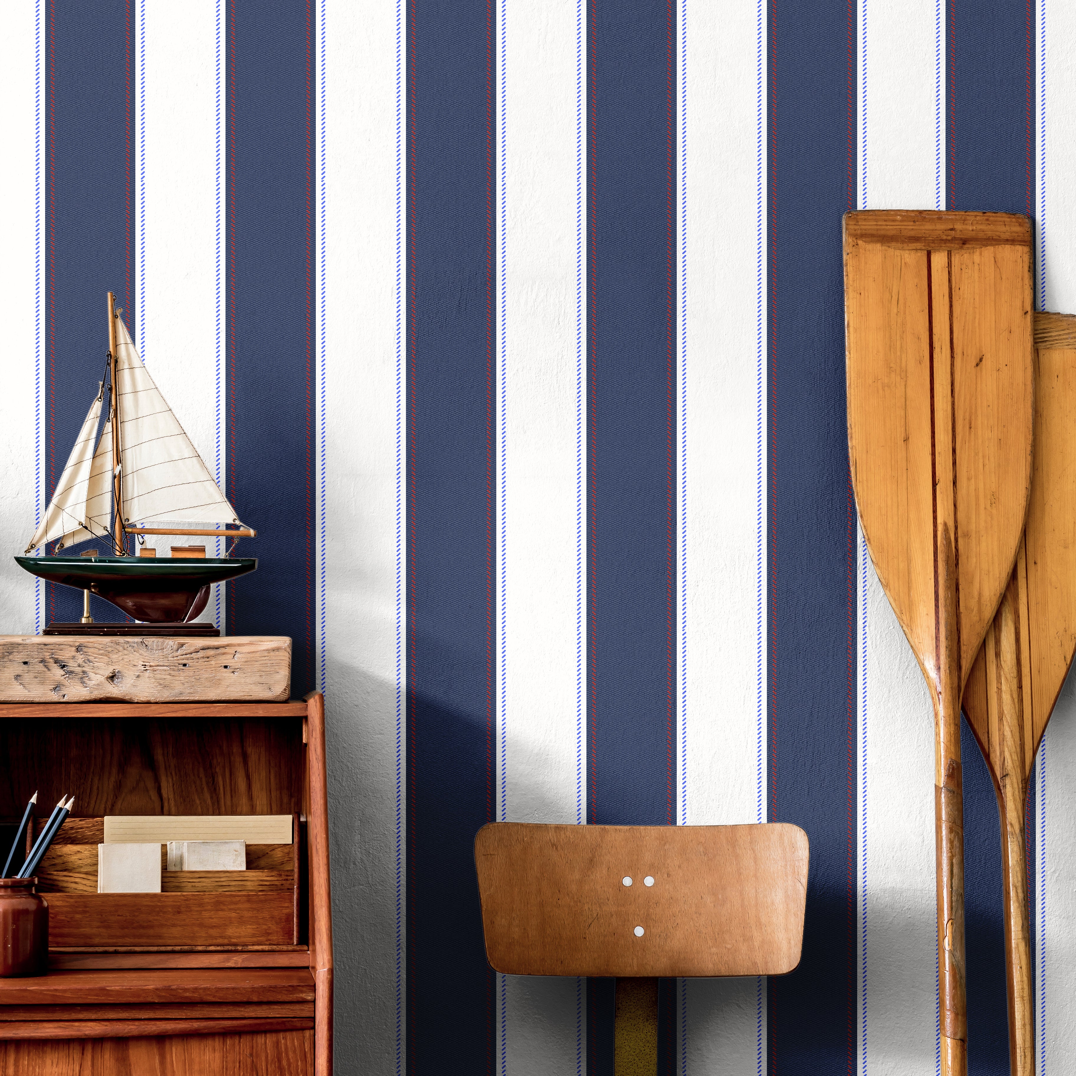 classic navy pinstripe wallpaper with red detail in office setting