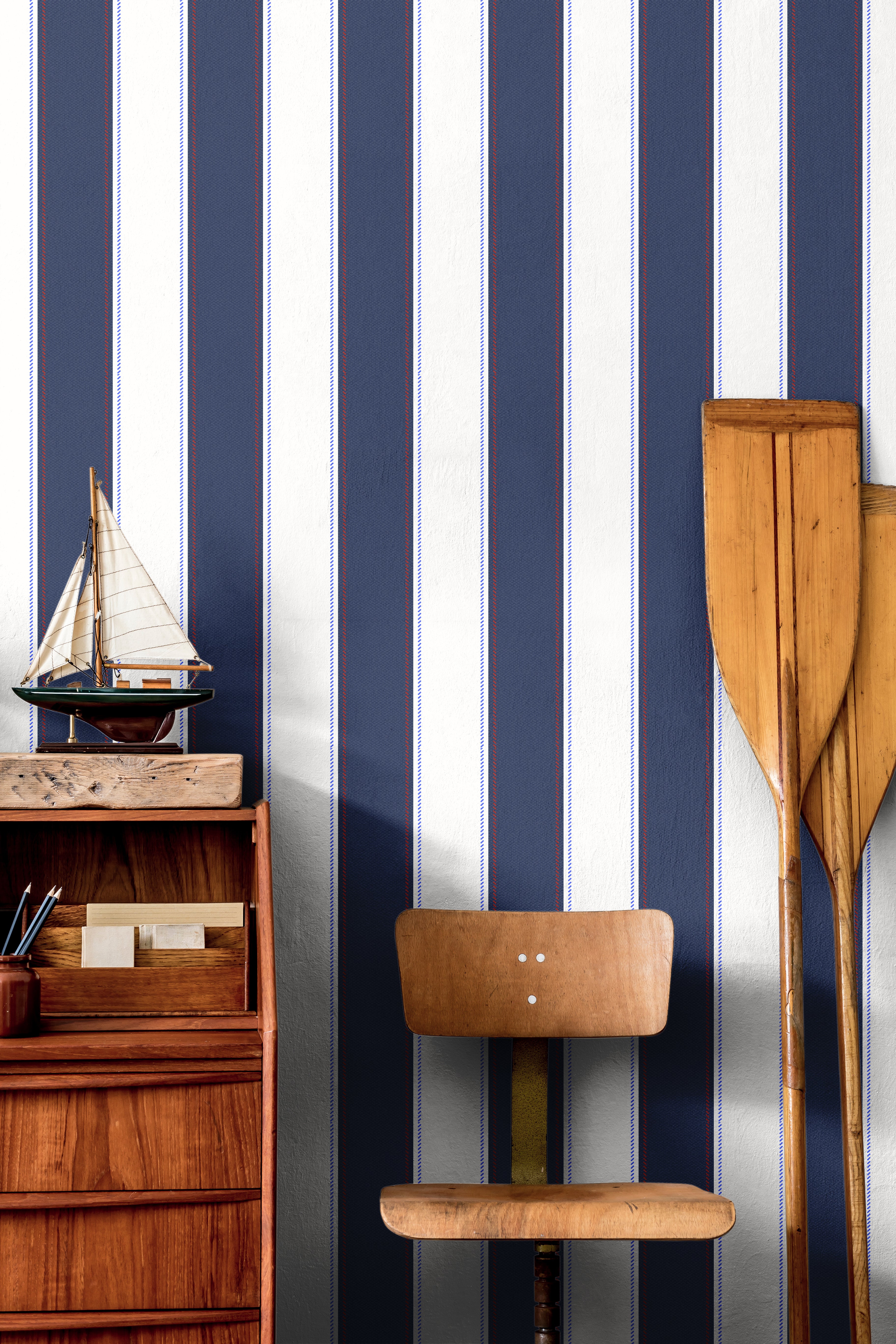 classic navy pinstripe wallpaper with red detail in office setting