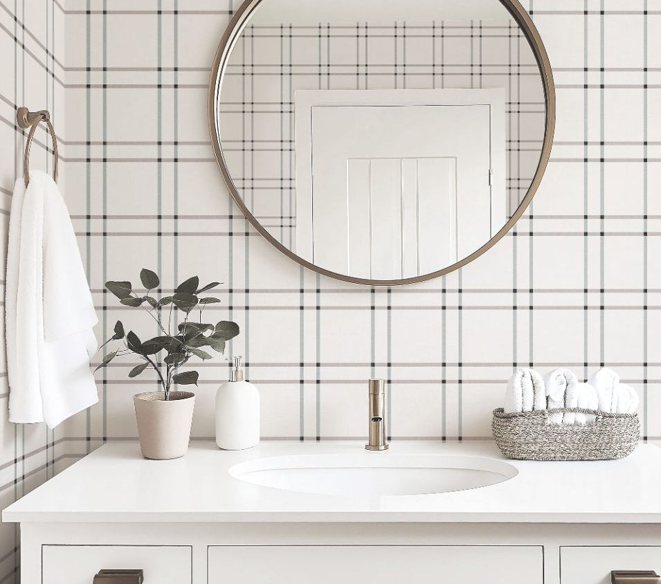 bathroom interior with serene grid neutral plaid wallpaper in taupe and gray, styled with white fixtures and soft modern accents