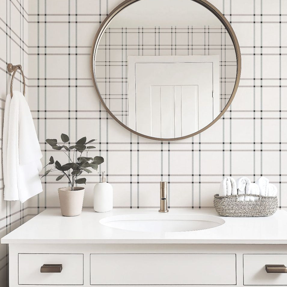 bathroom interior with serene grid neutral plaid wallpaper in taupe and gray, styled with white fixtures and soft modern accents