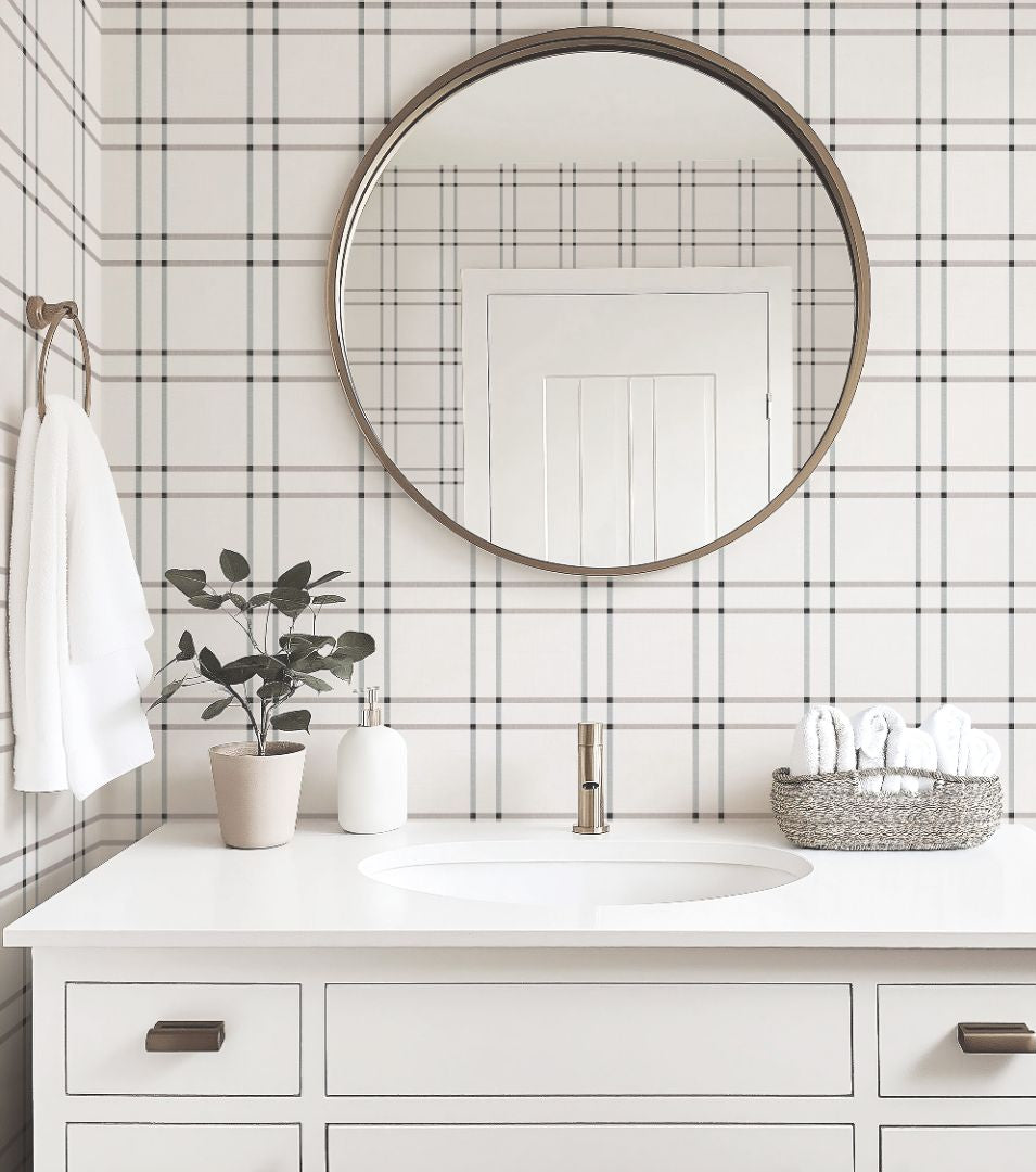 bathroom interior with serene grid neutral plaid wallpaper in taupe and gray, styled with white fixtures and soft modern accents