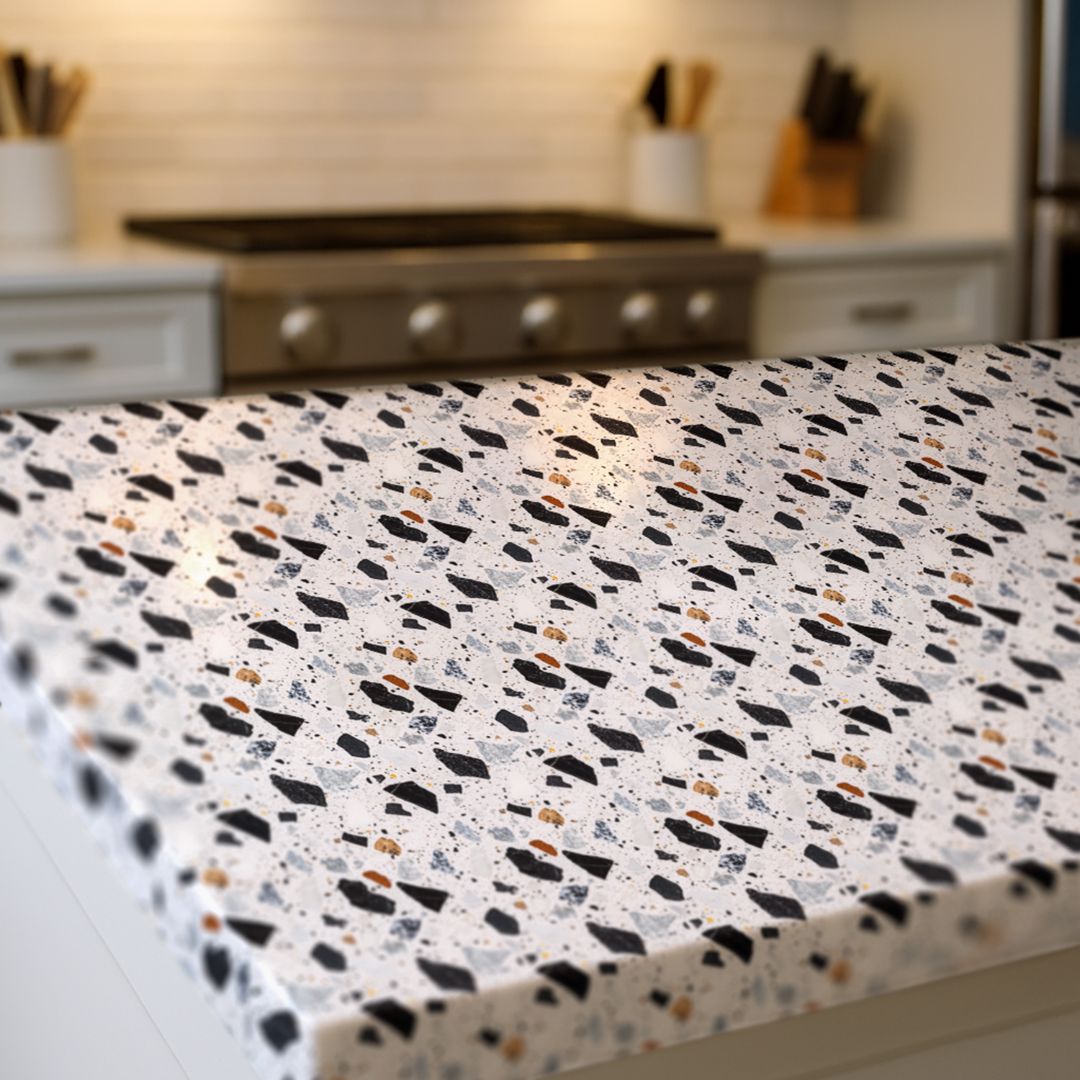 Shadow Terra Countertop Film displayed on a kitchen island, revealing modern terrazzo texture with a balanced neutral palette.