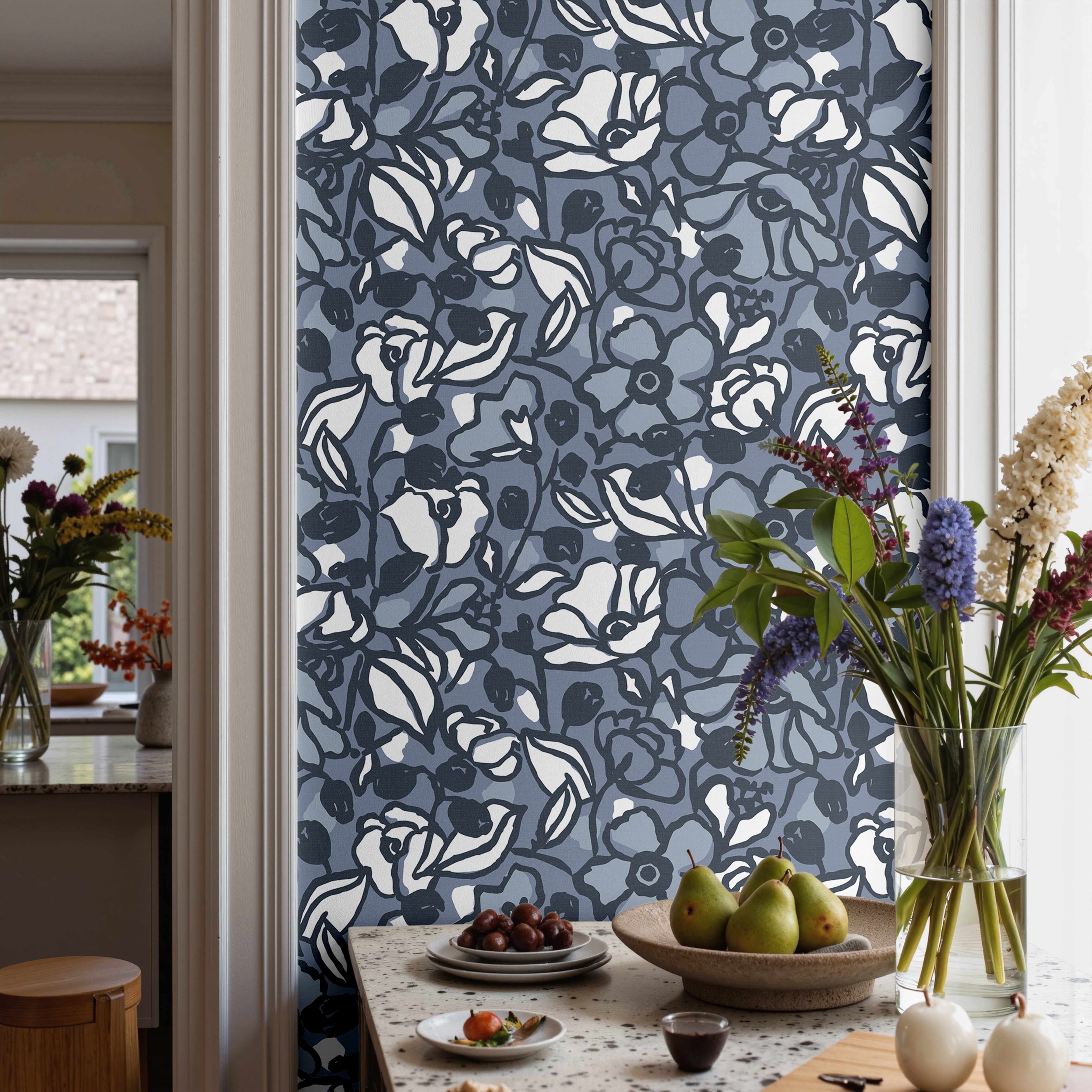  Vintage inspired blue floral wallpaper creating a cozy collected interior.