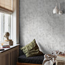 minimal interior featuring soft cement texture wallpaper with clean architectural aesthetic
