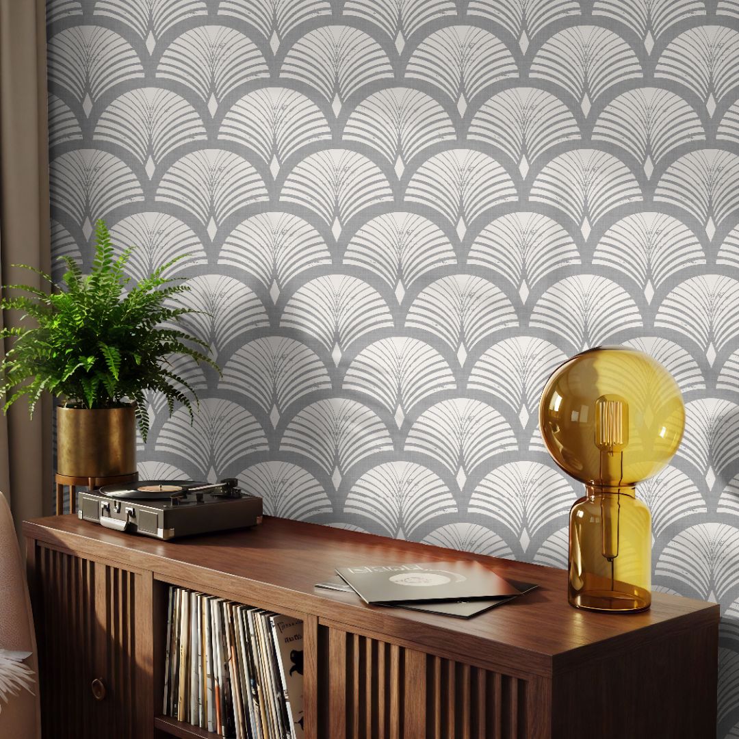 Stormcroft Wallpaper styled behind a wood console and amber lamp, showcasing warm light reflections on gray tones