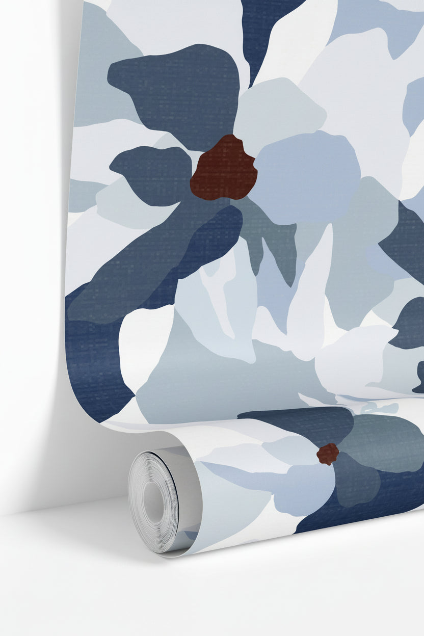 wallpaper roll showing blue gray floral pattern detail
