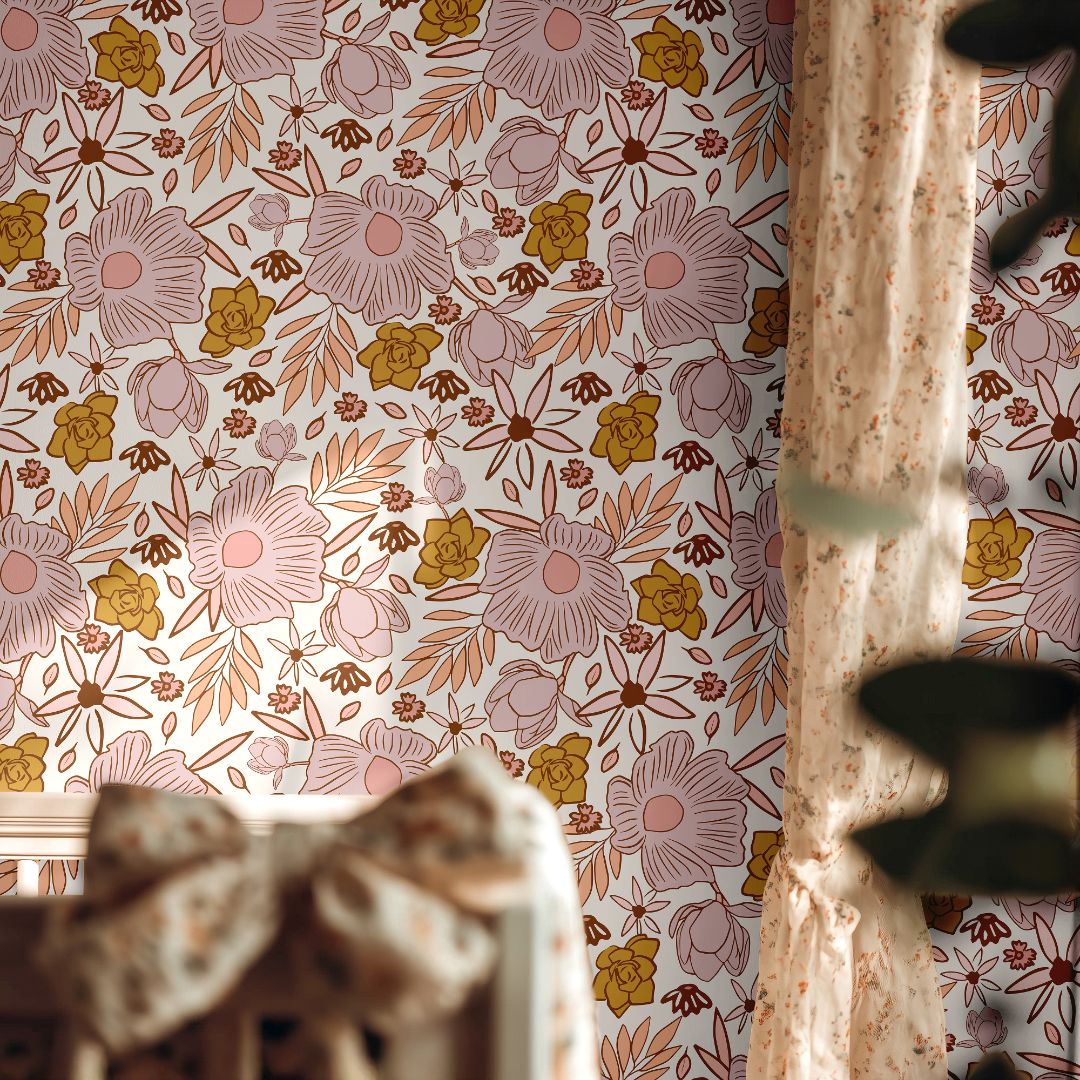 soft floral nursery wallpaper featuring blush blooms, warm mustard roses, and delicate botanical details