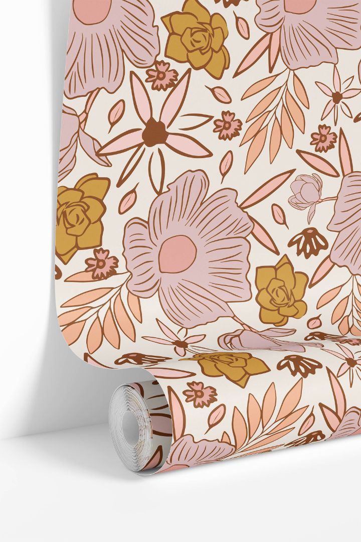 Sweetbriar Nursery wallpaper roll showing blush, peach, and mustard floral pattern on an ivory base