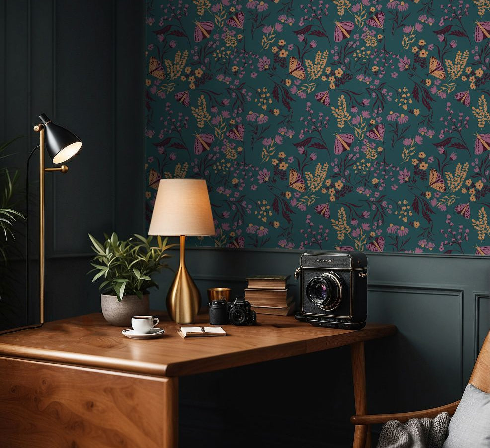  Desk workspace featuring Tealmore Wilds teal botanical wallpaper with butterflies, wildflowers, and golden florals.