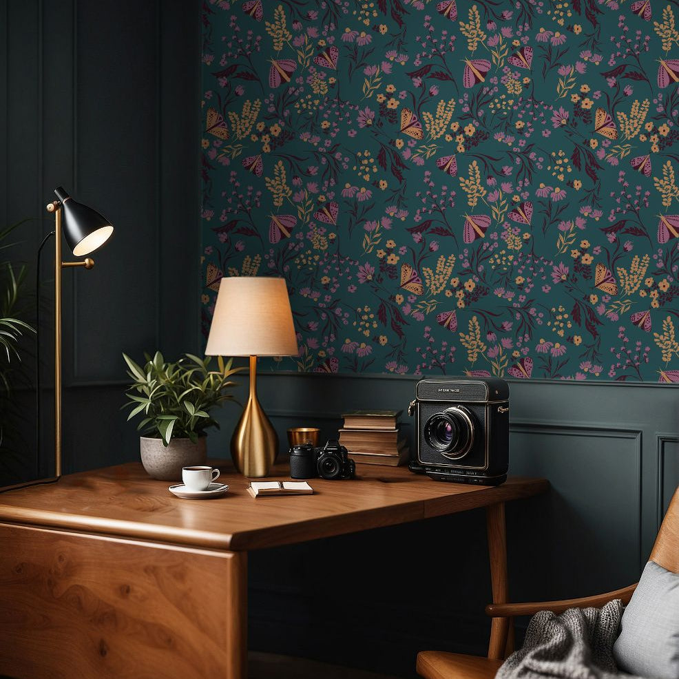  Desk workspace featuring Tealmore Wilds teal botanical wallpaper with butterflies, wildflowers, and golden florals.
