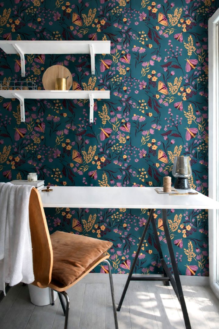 Interior room styled with Tealmore Wilds wallpaper showing butterflies and wildflowers on a rich teal botanical background.