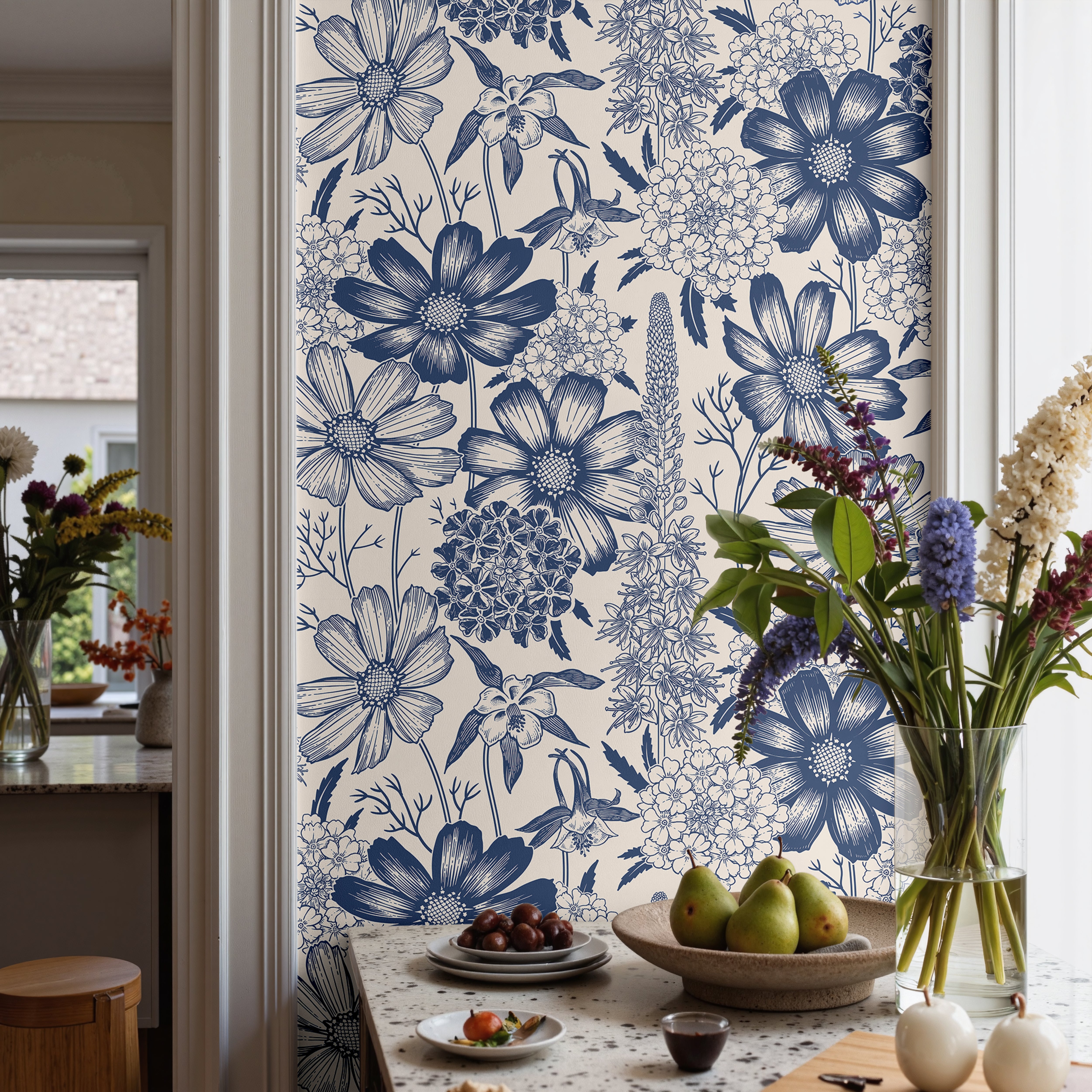 Vintage inspired blue botanical wallpaper with intricate floral blooms on a soft ivory background.