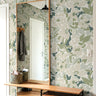 green botanical wallpaper with abstract floral pattern in entryway