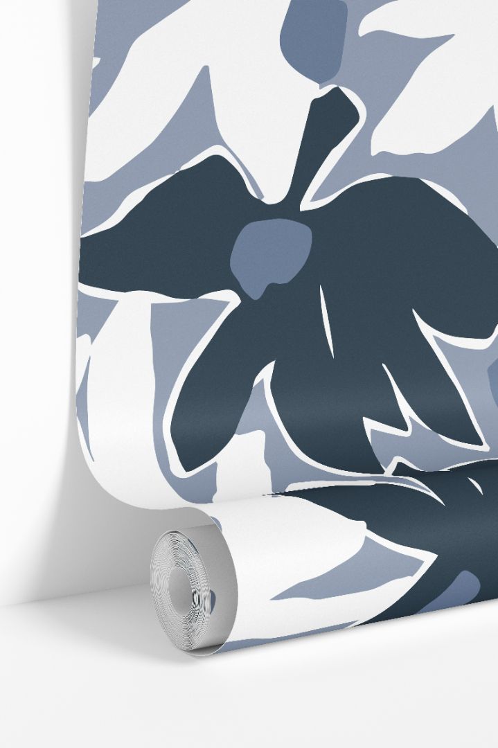 Rolled wallpaper showcasing the soft coastal blue print.