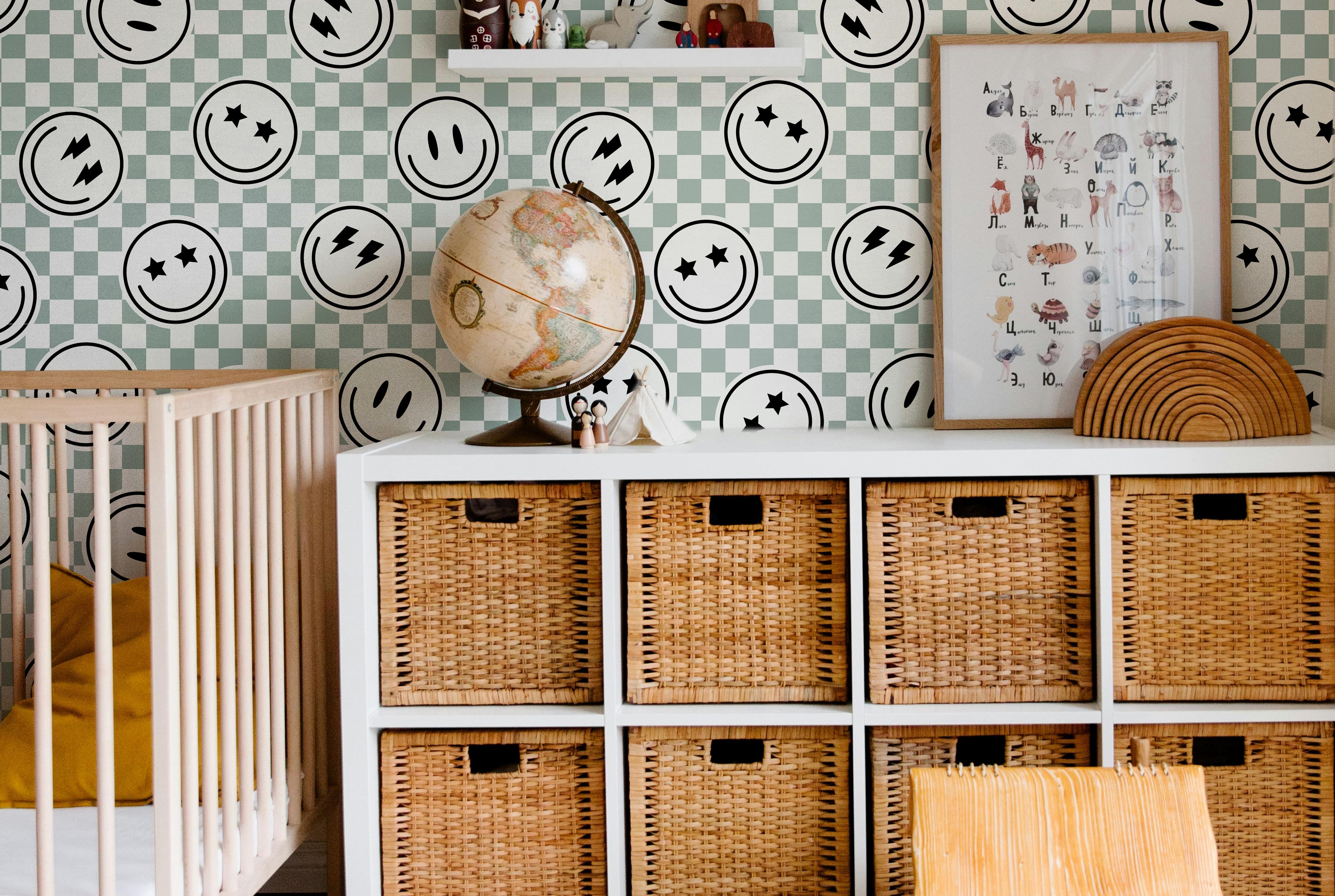 checker wallpaper with smiley icons in shared kids playroom