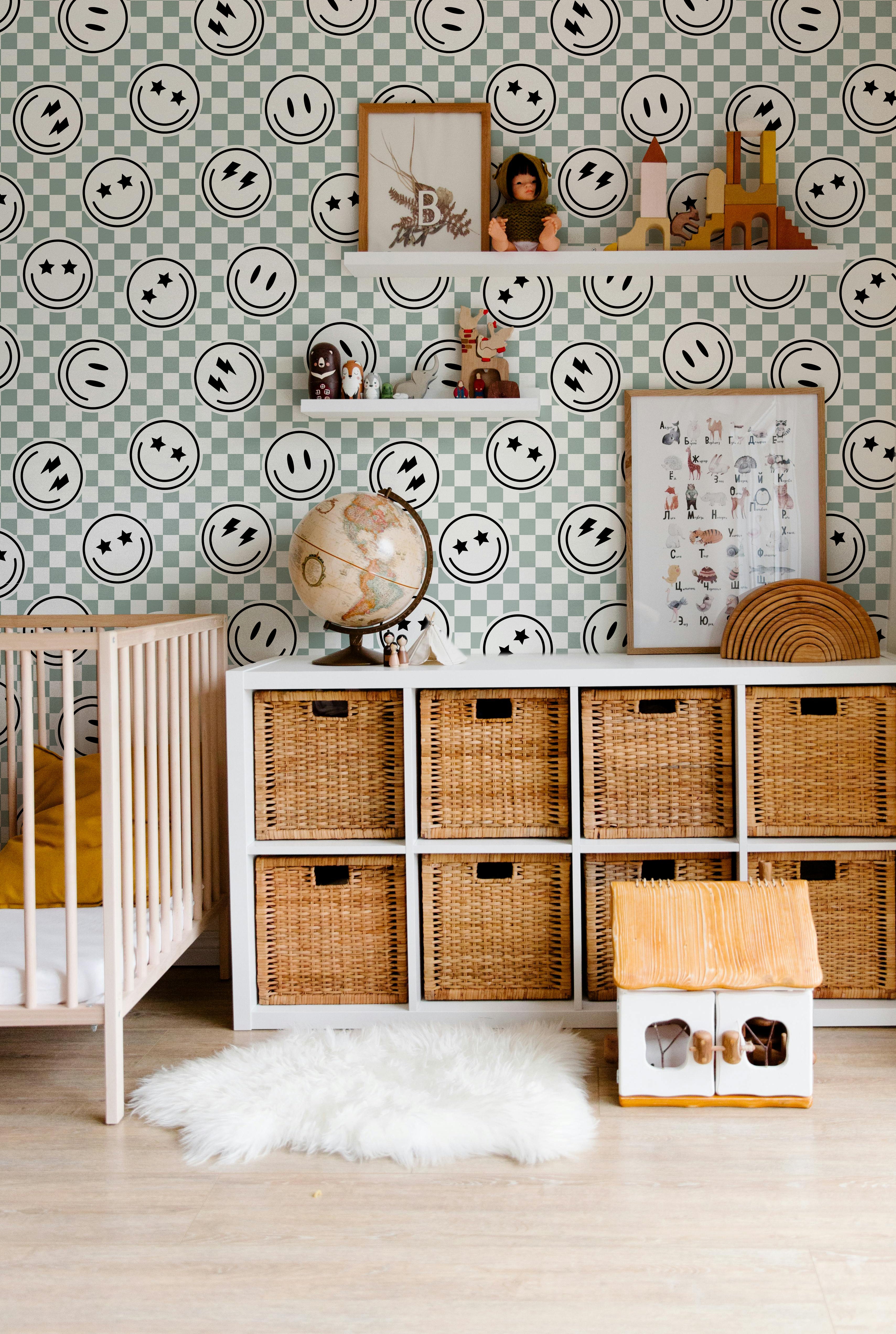 checker wallpaper with smiley icons in shared kids playroom