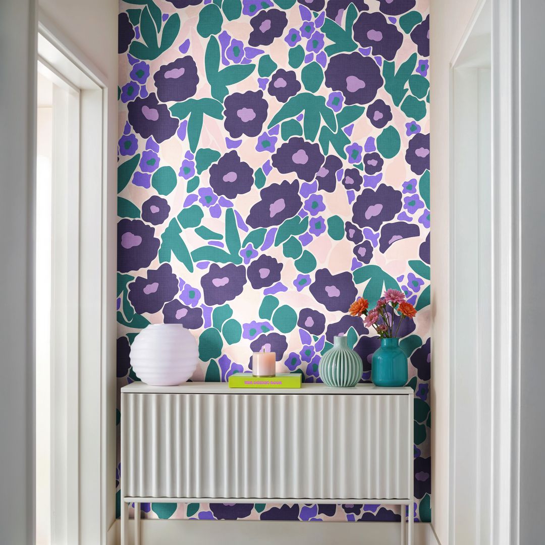 Hallway styled with Violetta Bloom Wallpaper, showcasing large violet and teal florals with soft blush undertones for a modern, elegant look.