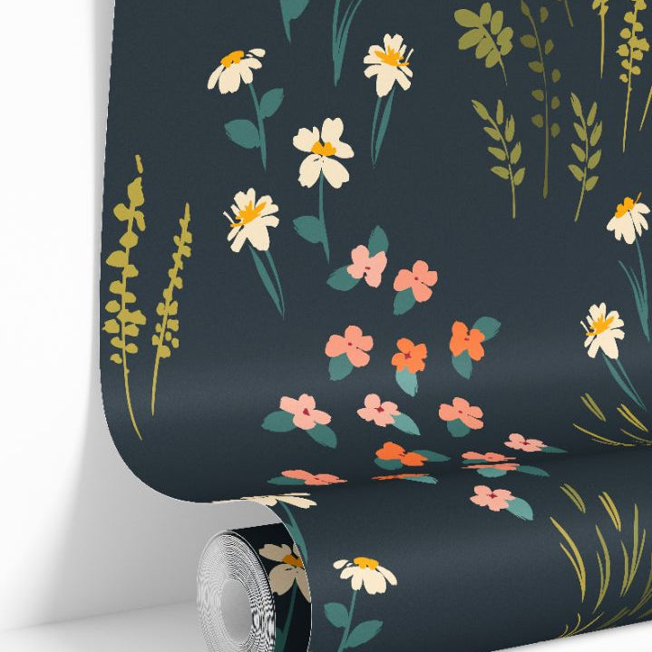 Vivenne Grove Wallpaper roll featuring painterly coral and gold florals on a deep navy background.