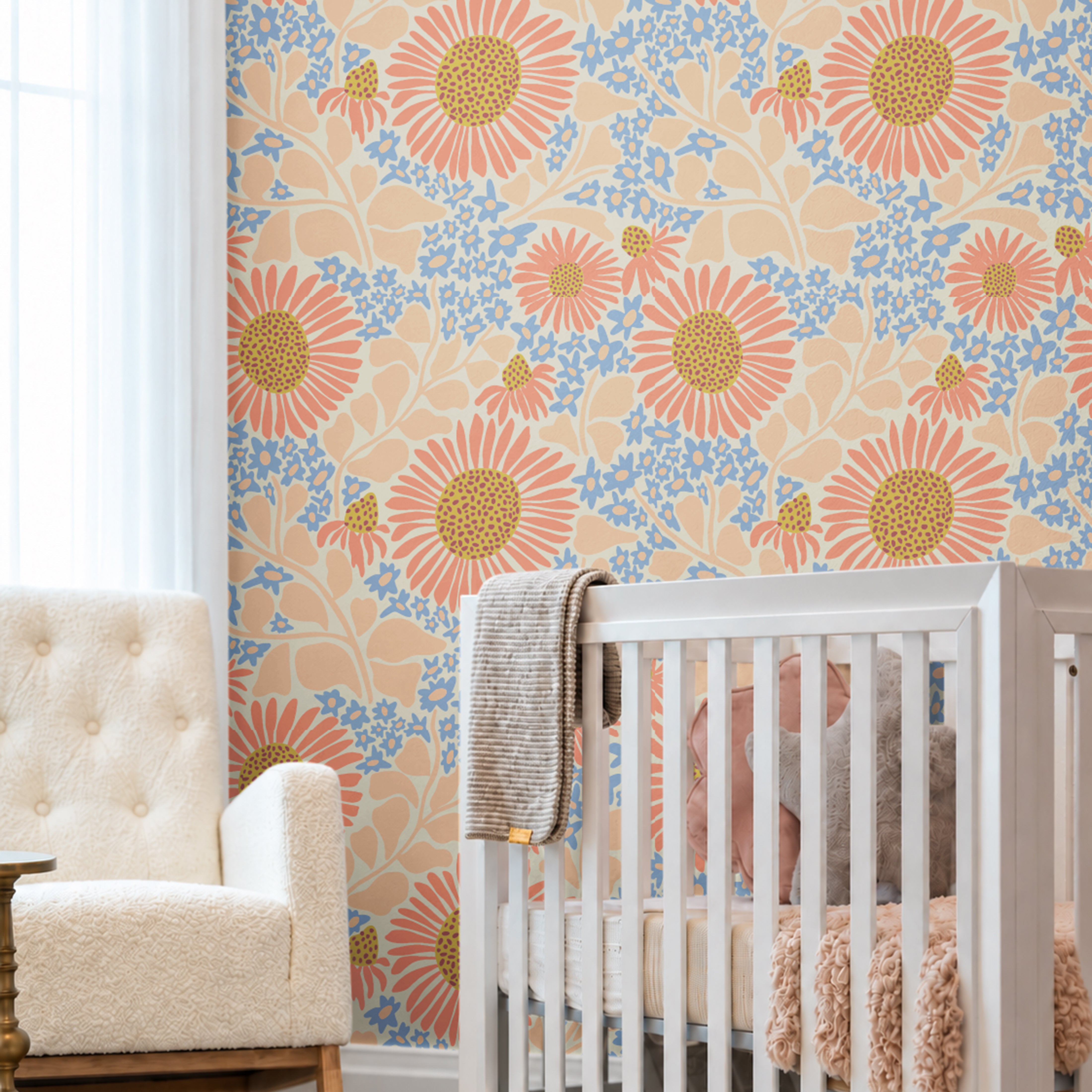 Warm Bloom colorful floral wallpaper with coral flowers, soft blue blossoms and peach foliage in a bright neutral nursery