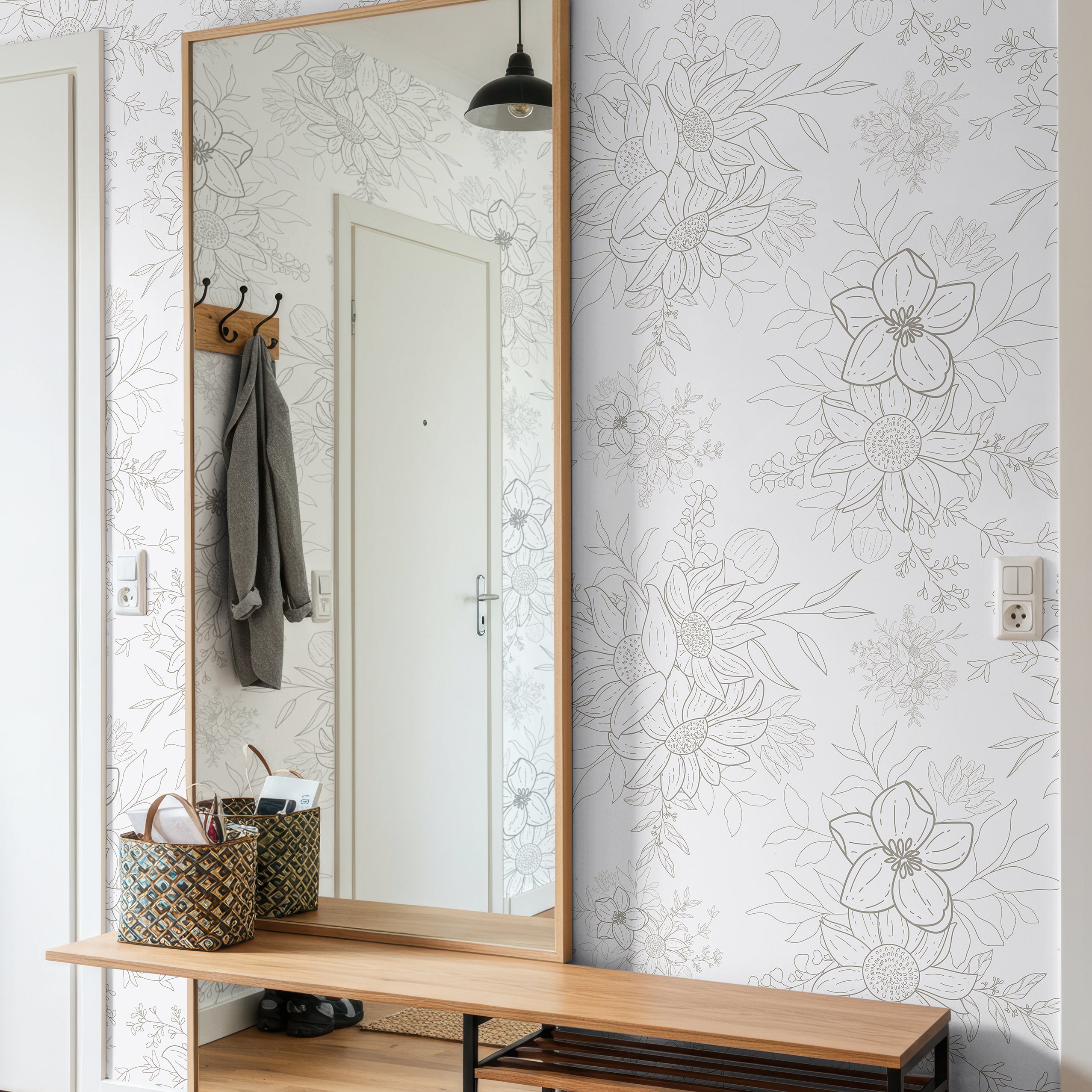 modern interior featuring subtle gray floral wallpaper with open pattern layout
