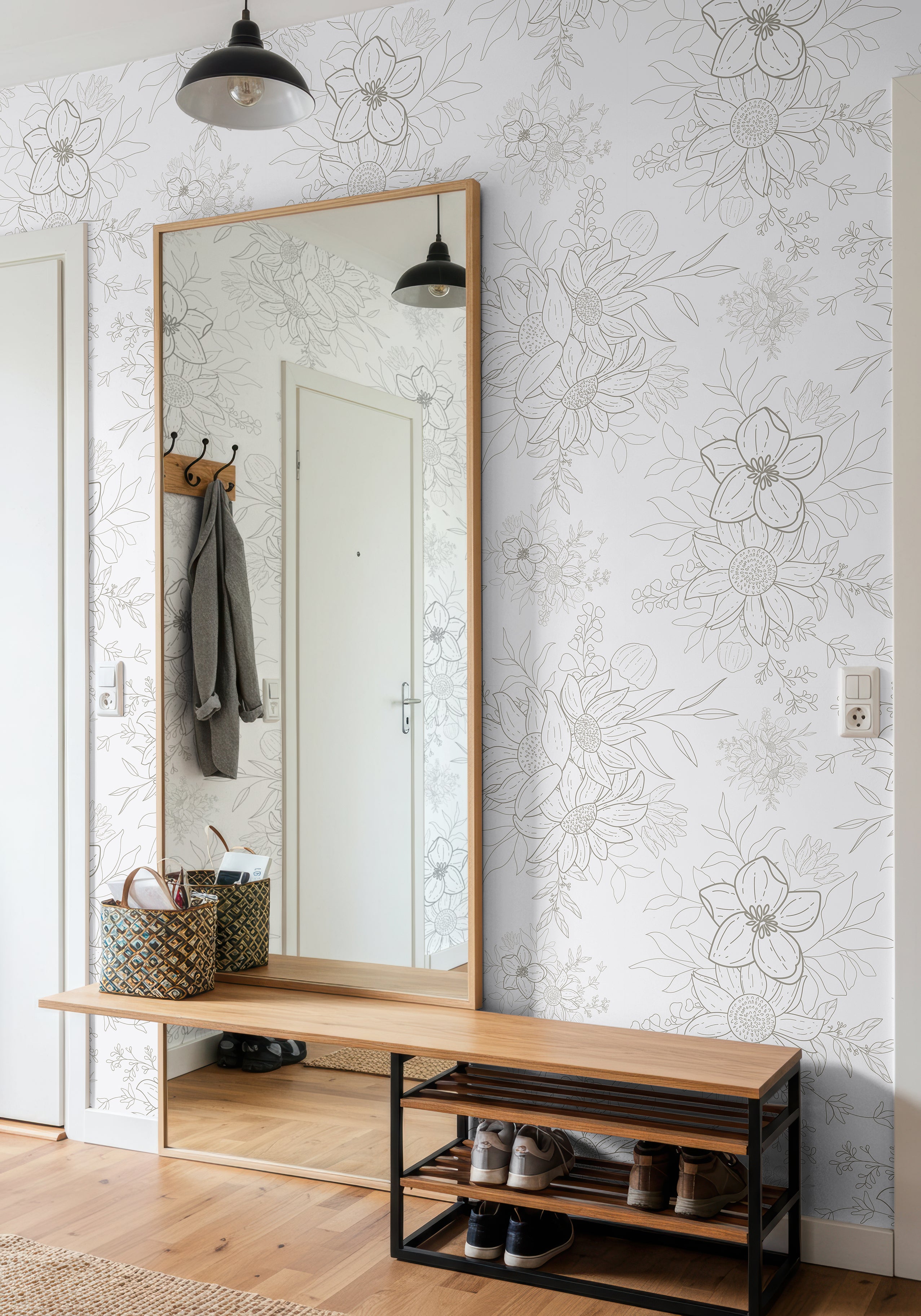 modern interior featuring subtle gray floral wallpaper with open pattern layout
