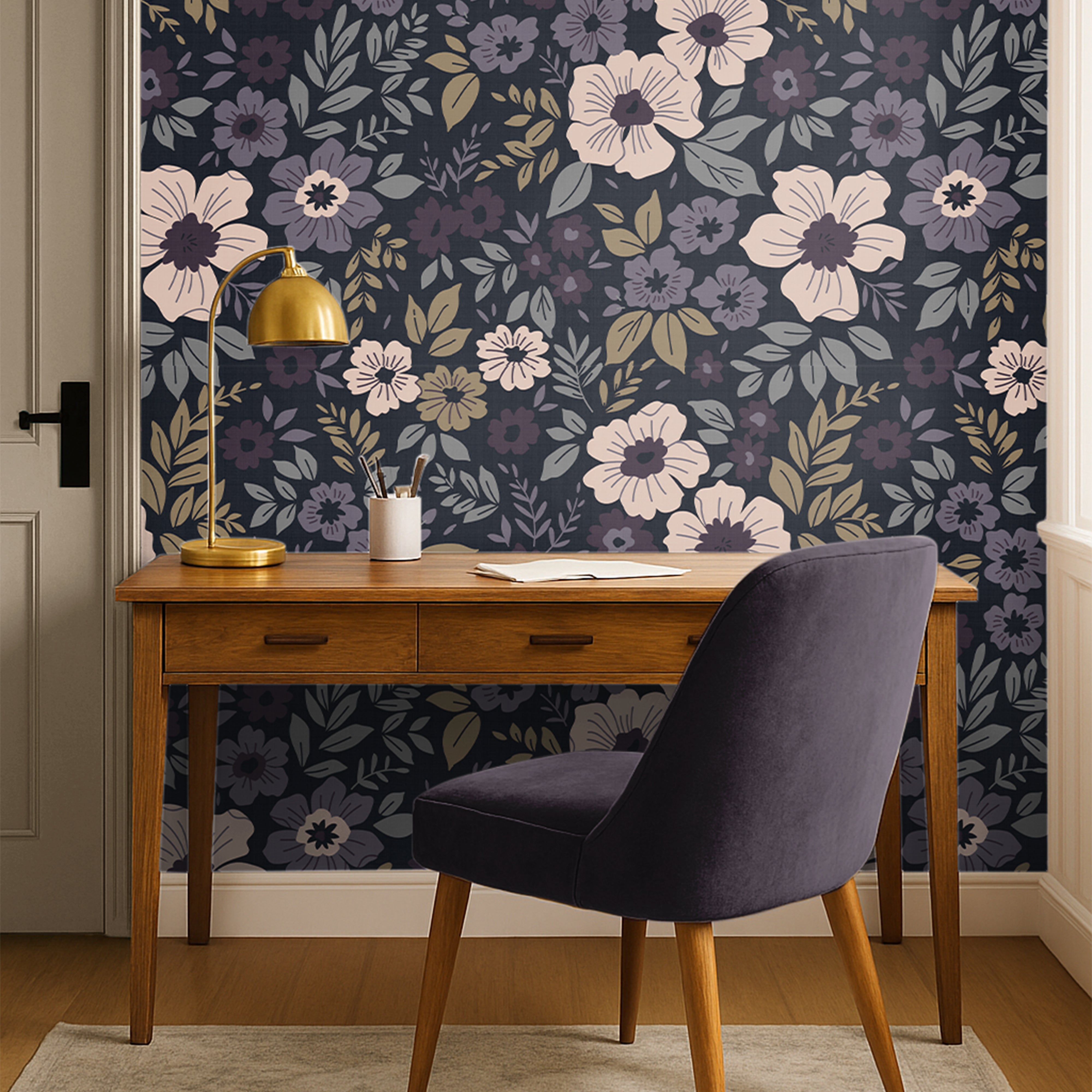 plum floral wallpaper behind plum chair and warm wood office desk 