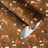 Wildwood Moth Peel and Stick Contact Paper with amber background, white blooms, and moth details