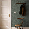 moody green floral wallpaper with vintage botanical pattern in entryway with wood accents